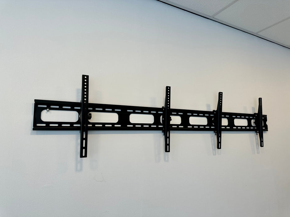 Wolff Mount Dubbel universell TV-väggfäste |Diskbana |2 skärmar |Tiltbar |2 meter
