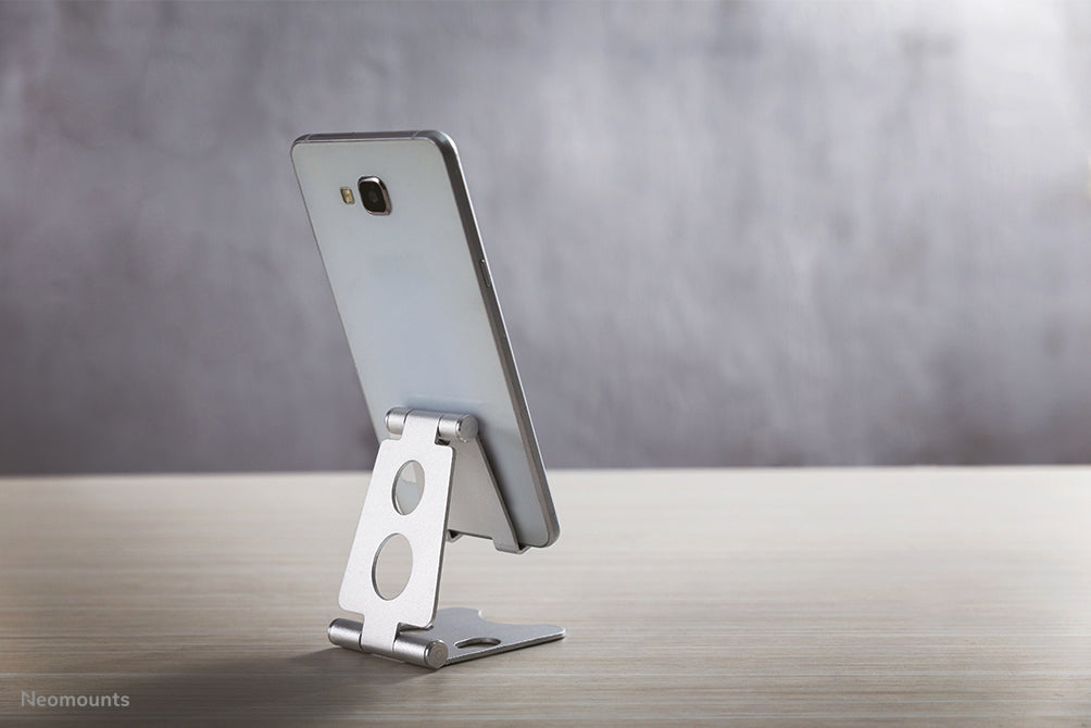 Neomounts universellt hopfällbart telefonstöd - Silver