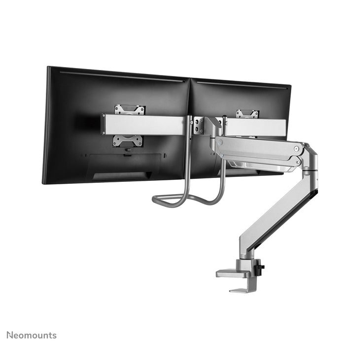 Neomounts NM-D775DX silver är ett gasfjädrat skrivbordsstöd med tvärstång och handtag för platta skärmar upp till 32 tum (81 cm).