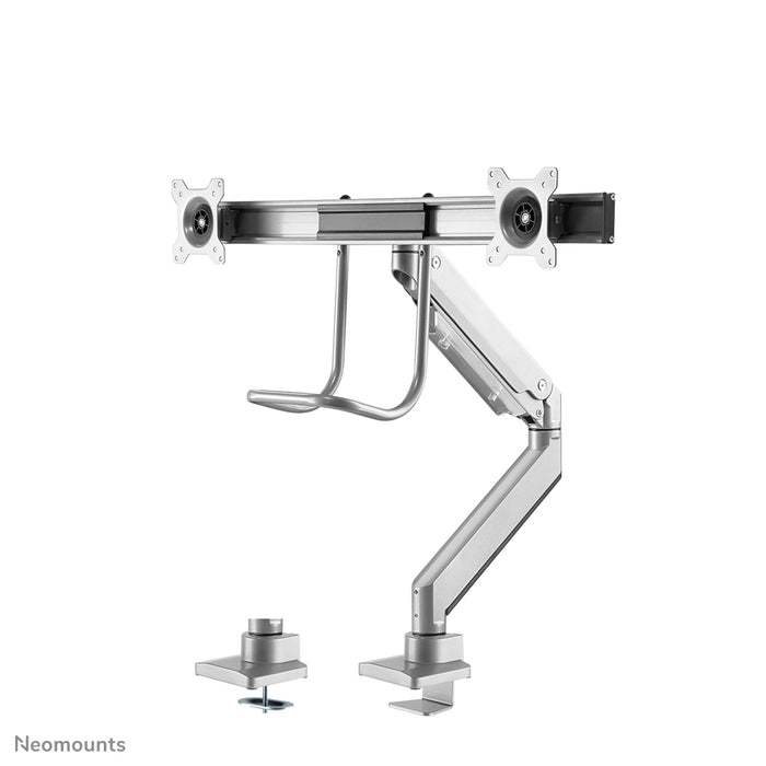 Neomounts NM-D775DX silver är ett gasfjädrat skrivbordsstöd med tvärstång och handtag för platta skärmar upp till 32 tum (81 cm).