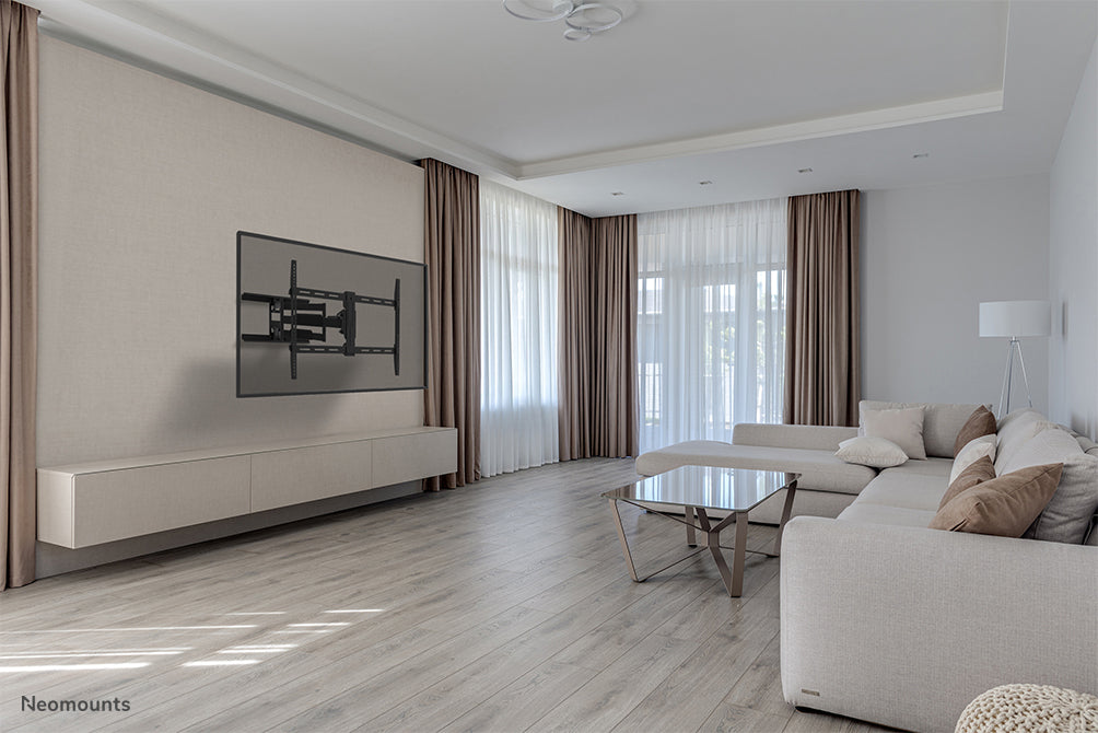 Neomounts WL40-550BL18 fullrörligt väggfäste för 43-75 tums skärmar - Svart